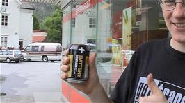 Olly couldn't resist trying this "battery" energy drink from the SPAR at Kinsarvik - he didn't like it too much - 6.6 miles into the ride